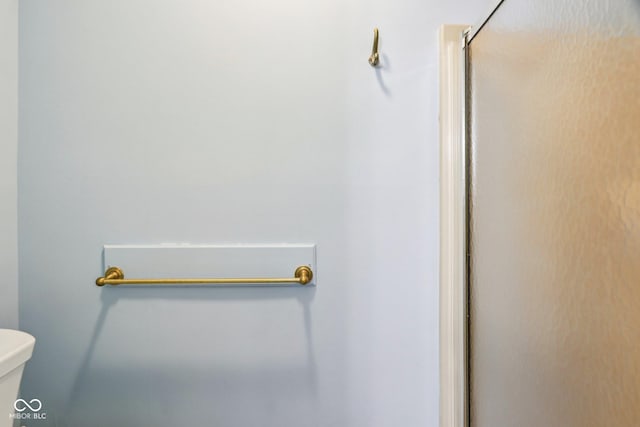 9240 E Woodview Dr, Bloomington, IN 47401 - bathroom featuring toilet and a stall shower