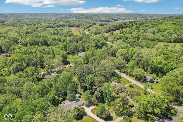 9240 E Woodview Dr, Bloomington, IN 47401 - aerial view of property and surrounding area featuring a heavily wooded area