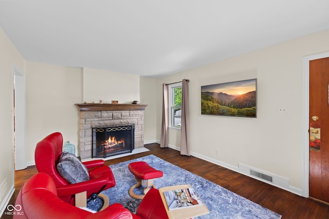 909 E Markwood Ave, Indianapolis, IN 46227 - living area with a fireplace, baseboards, and wood finished floors