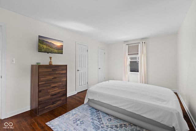 909 E Markwood Ave, Indianapolis, IN 46227 - bedroom with hardwood / wood-style flooring and baseboards