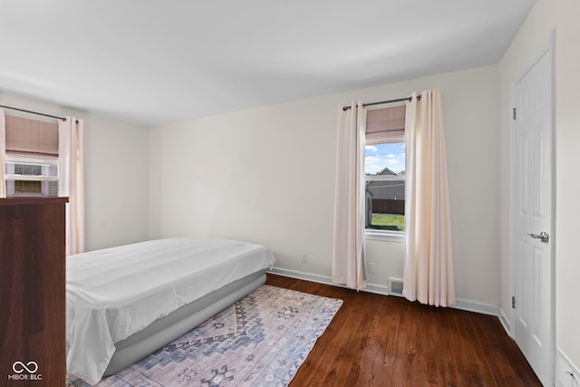 909 E Markwood Ave, Indianapolis, IN 46227 - bedroom with hardwood / wood-style floors, baseboards, and cooling unit