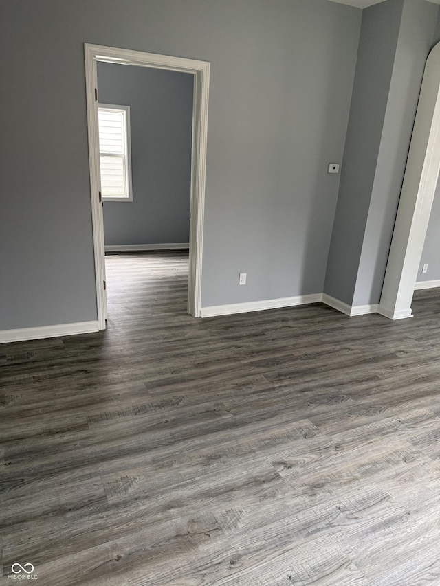 23 S Holmes Ave, Indianapolis, IN 46222 - unfurnished room featuring baseboards and wood finished floors