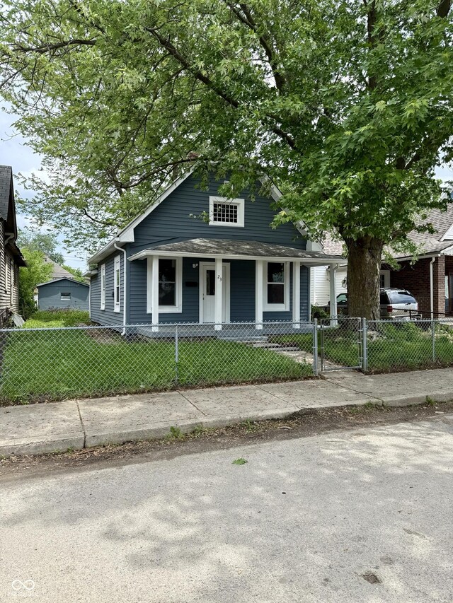 23 S Holmes Ave, Indianapolis, IN 46222 - view of front of property featuring covered porch