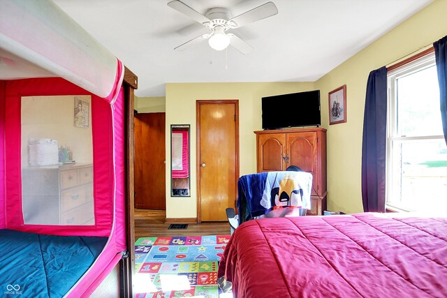 3310 Ransdell St, Indianapolis, IN 46227 - bedroom with wood finished floors and a ceiling fan