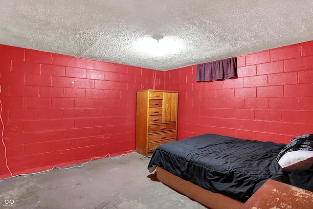 3310 Ransdell St, Indianapolis, IN 46227 - bedroom featuring unfinished concrete floors and concrete block wall