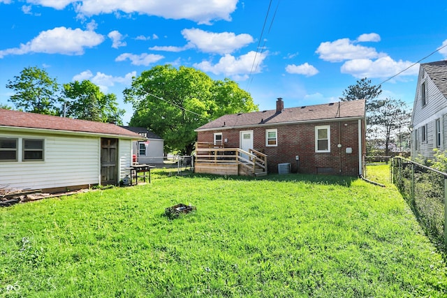 3310 Ransdell St, Indianapolis, IN 46227 - back of property with a chimney, cooling unit, and brick siding