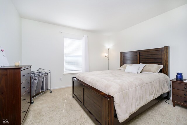 14135 Nicholas Dr, Carmel, IN 46074 - bedroom featuring light carpet and baseboards