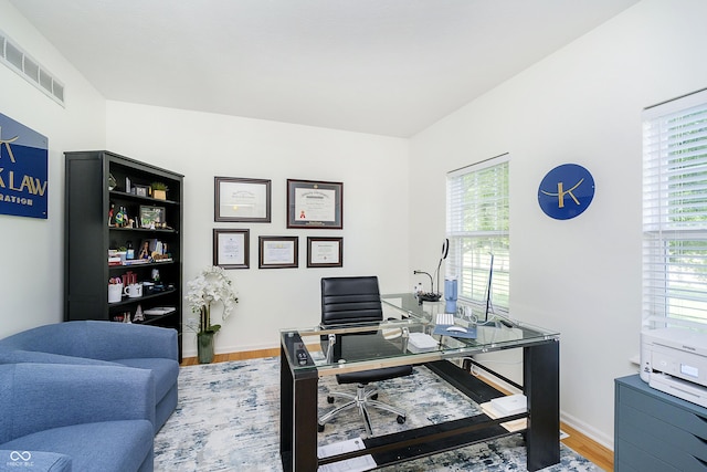 14135 Nicholas Dr, Carmel, IN 46074 - office with plenty of natural light, wood finished floors, and baseboards