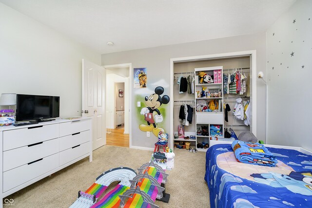 14135 Nicholas Dr, Carmel, IN 46074 - bedroom featuring a closet, light carpet, and baseboards