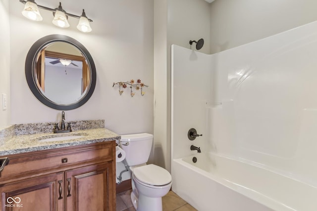 2825 S State Road 267, Plainfield, IN 46168 - bathroom featuring vanity, toilet, shower / washtub combination, tile patterned flooring, and ceiling fan