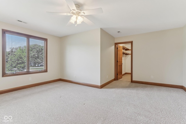 2825 S State Road 267, Plainfield, IN 46168 - empty room featuring light carpet, baseboards, and ceiling fan