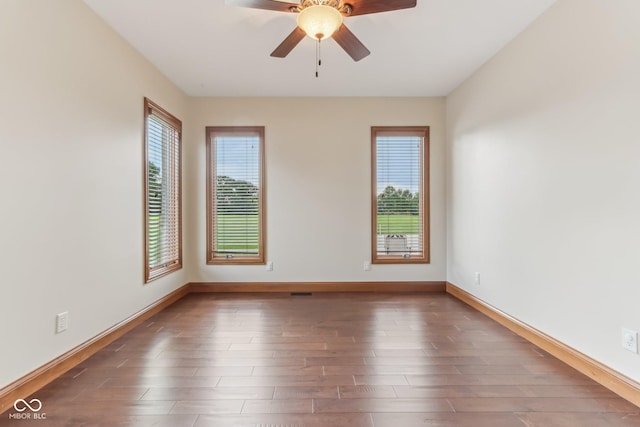 2825 S State Road 267, Plainfield, IN 46168 - empty room with wood finished floors, baseboards, and a ceiling fan