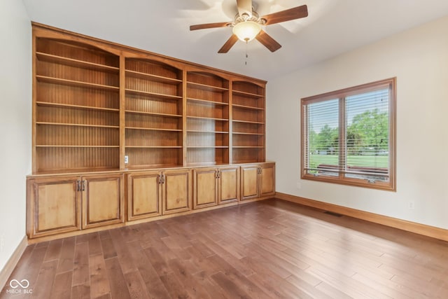 2825 S State Road 267, Plainfield, IN 46168 - unfurnished room with baseboards, dark wood-style flooring, and a ceiling fan