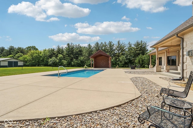 2825 S State Road 267, Plainfield, IN 46168 - outdoor pool featuring a patio, a lawn, and view of scattered trees
