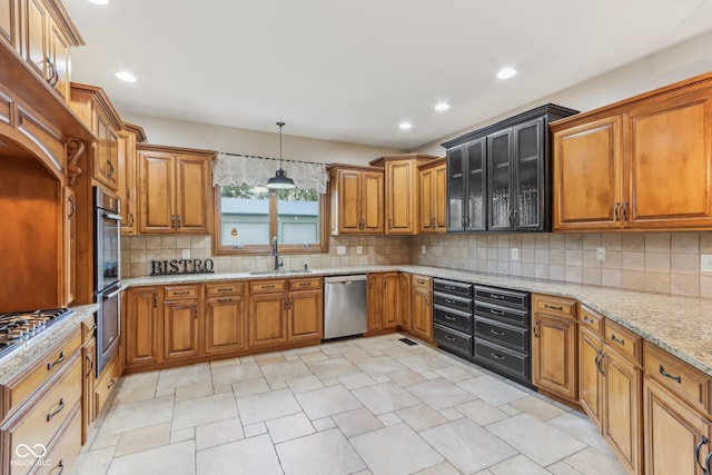 2825 S State Road 267, Plainfield, IN 46168 - kitchen with stainless steel appliances, a sink, brown cabinets, and recessed lighting