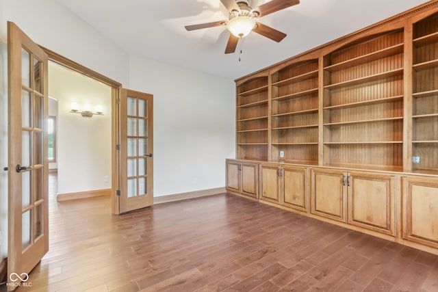 2825 S State Road 267, Plainfield, IN 46168 - empty room with french doors, dark wood-style flooring, ceiling fan, and baseboards