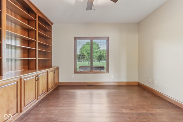 2825 S State Road 267, Plainfield, IN 46168 - unfurnished room featuring a ceiling fan, wood finished floors, and baseboards