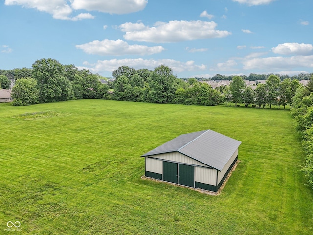 2825 S State Road 267, Plainfield, IN 46168 - view of grassy yard featuring an outbuilding, an outdoor structure, and view of scattered trees