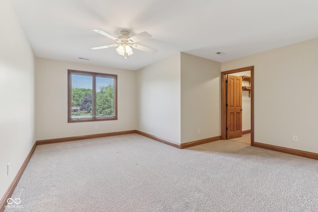 2825 S State Road 267, Plainfield, IN 46168 - unfurnished room featuring light carpet, ceiling fan, and baseboards