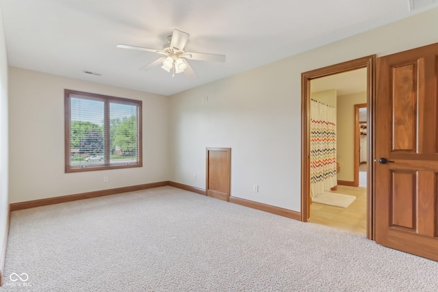 2825 S State Road 267, Plainfield, IN 46168 - empty room featuring light colored carpet, baseboards, and a ceiling fan