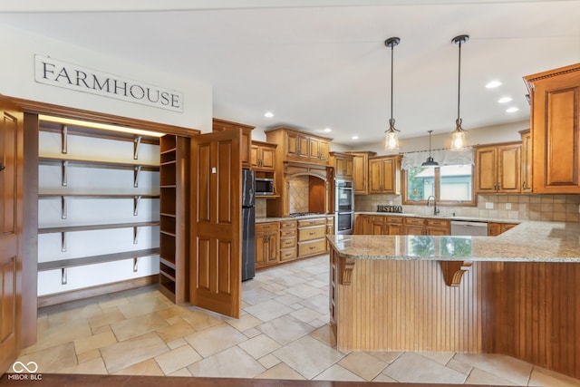 2825 S State Road 267, Plainfield, IN 46168 - kitchen with stainless steel appliances, a sink, brown cabinetry, a peninsula, and recessed lighting
