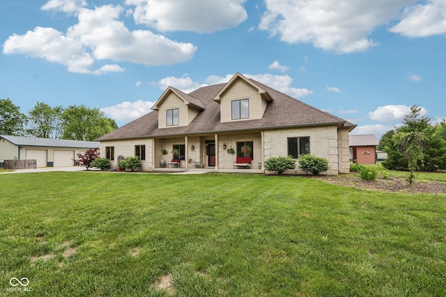 2825 S State Road 267, Plainfield, IN 46168 - view of front facade featuring a detached garage, a front lawn, roof with shingles, and brick siding