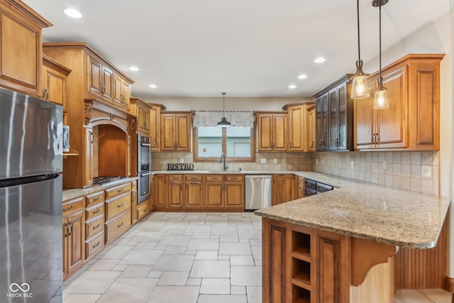 2825 S State Road 267, Plainfield, IN 46168 - kitchen with appliances with stainless steel finishes, a sink, brown cabinets, a peninsula, and recessed lighting