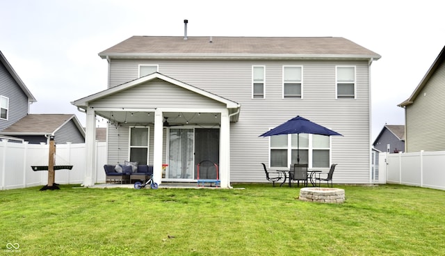 1880 Explorer Ct, Franklin, IN 46131 - back of house with a sunroom, a patio, and a fire pit