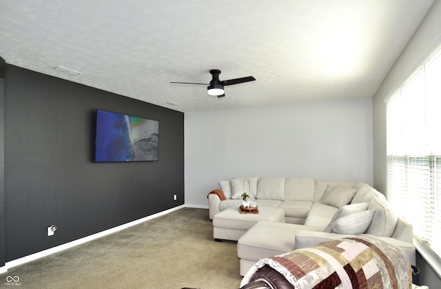 1880 Explorer Ct, Franklin, IN 46131 - living area with carpet flooring, a ceiling fan, and baseboards