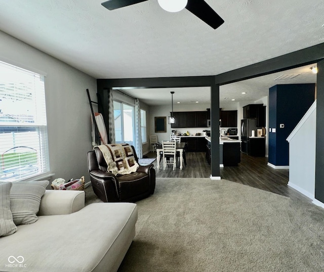 1880 Explorer Ct, Franklin, IN 46131 - living room featuring a ceiling fan, dark wood finished floors, baseboards, a textured ceiling, and recessed lighting