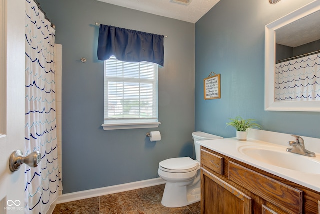 7452 Lace Bark Ct, Avon, IN 46123 - full bathroom with toilet, vanity, baseboards, and a shower with shower curtain