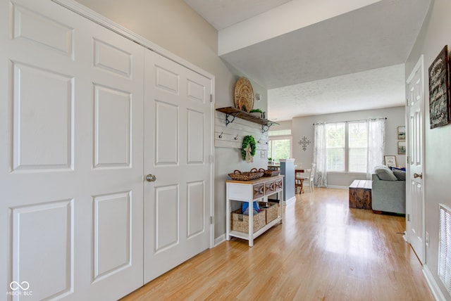 7452 Lace Bark Ct, Avon, IN 46123 - hallway featuring light wood-style floors and baseboards