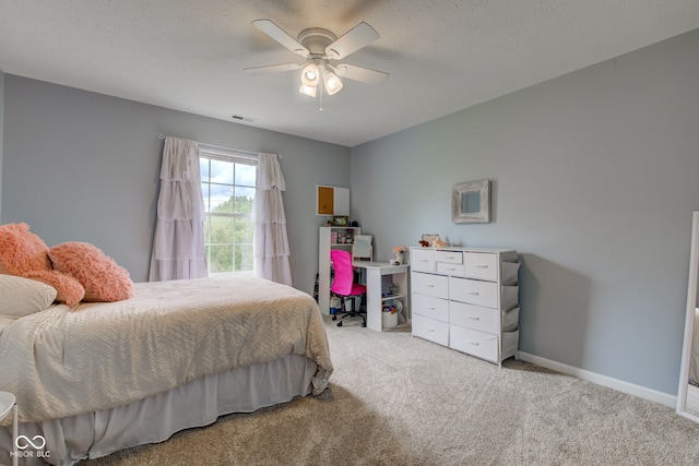 7452 Lace Bark Ct, Avon, IN 46123 - carpeted bedroom with ceiling fan and baseboards