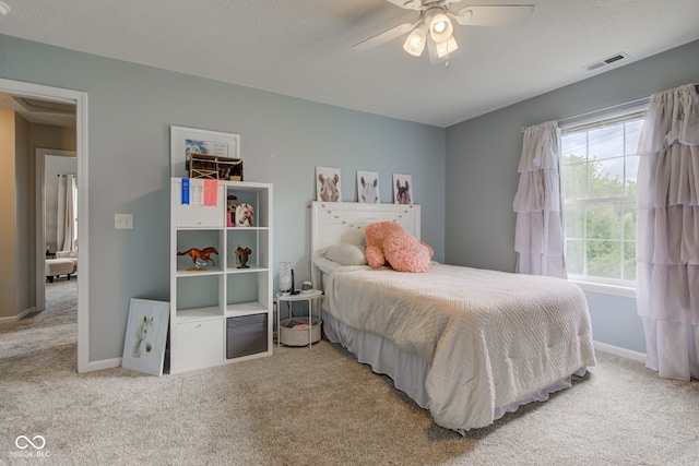 7452 Lace Bark Ct, Avon, IN 46123 - bedroom with carpet floors, baseboards, and ceiling fan