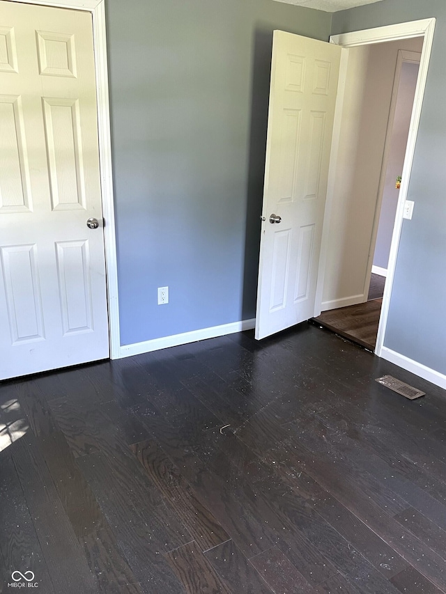 261 S Main St, Marshall, IN 47859 - unfurnished room with wood-type flooring and baseboards