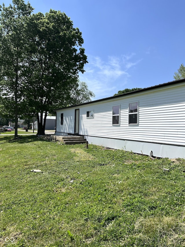 261 S Main St, Marshall, IN 47859 - rear view of property with a yard