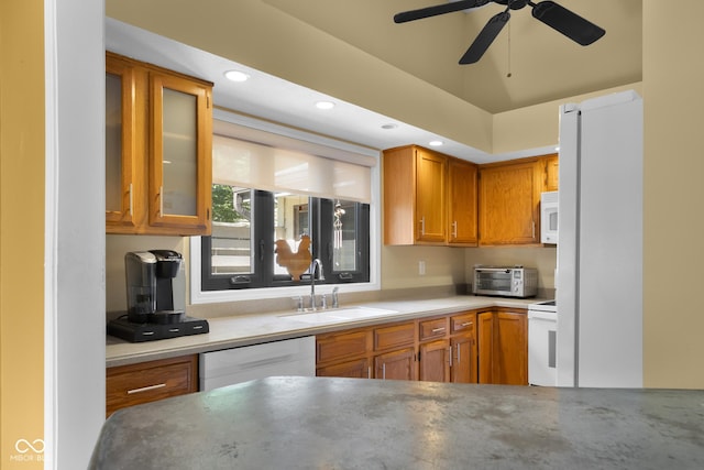 740 Carya Sq, Columbus, IN 47201 - kitchen featuring a sink, white appliances, brown cabinets, ceiling fan, and glass insert cabinets