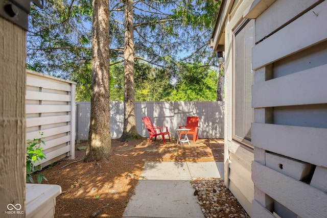 740 Carya Sq, Columbus, IN 47201 - fenced backyard featuring a patio area