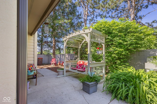 740 Carya Sq, Columbus, IN 47201 - view of patio featuring a fenced backyard and a pergola