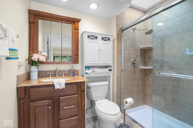 740 Carya Sq, Columbus, IN 47201 - bathroom with vanity, toilet, and tiled shower