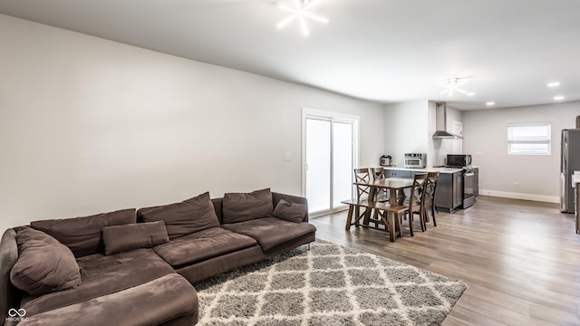 1342 N Oakland Ave, Indianapolis, IN 46201 - living area with baseboards, light wood-type flooring, and recessed lighting