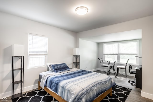 1342 N Oakland Ave, Indianapolis, IN 46201 - bedroom with wood finished floors and baseboards