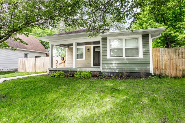 1342 N Oakland Ave, Indianapolis, IN 46201 - view of front of house featuring covered porch