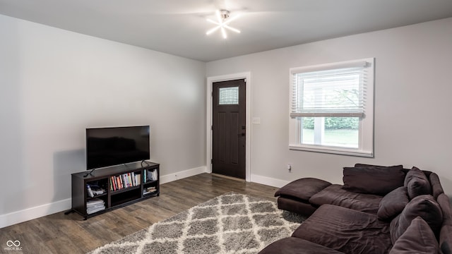 1342 N Oakland Ave, Indianapolis, IN 46201 - living area featuring baseboards and wood finished floors