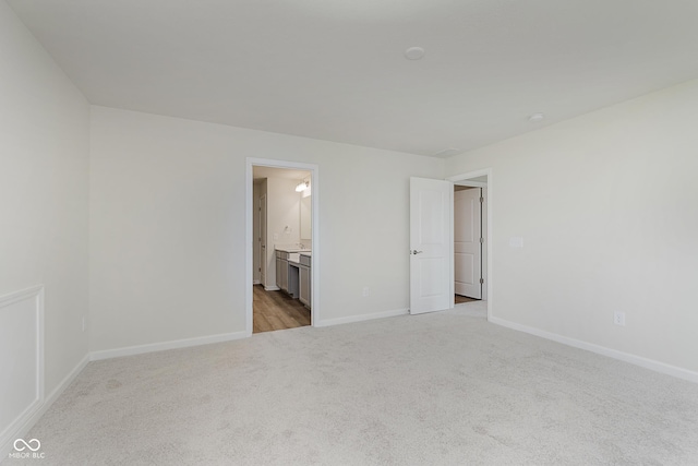 2705 Penn Ave, Plainfield, IN 46168 - unfurnished bedroom with light carpet and ensuite bathroom