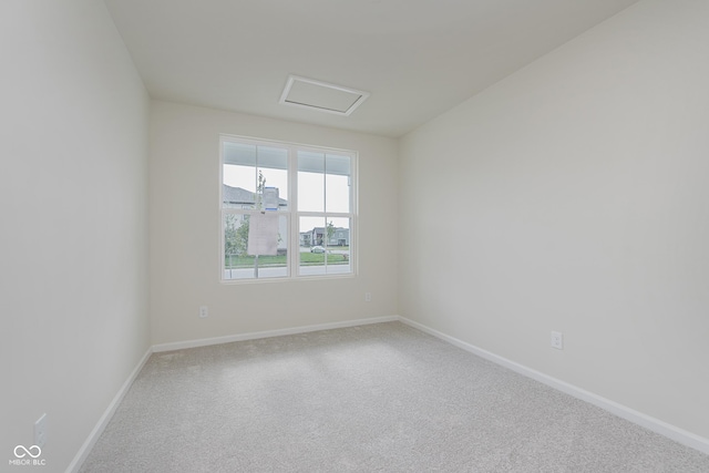 2705 Penn Ave, Plainfield, IN 46168 - carpeted spare room with attic access and baseboards