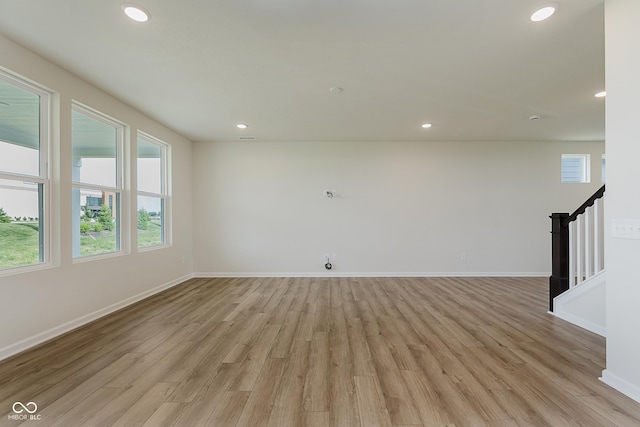 2705 Penn Ave, Plainfield, IN 46168 - spare room with light wood-style flooring, recessed lighting, and stairs