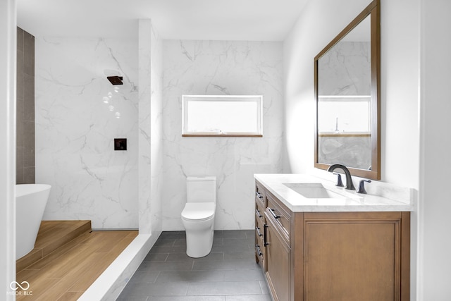 19 E Regent St, Indianapolis, IN 46225 - full bath with vanity, a soaking tub, toilet, and a marble finish shower