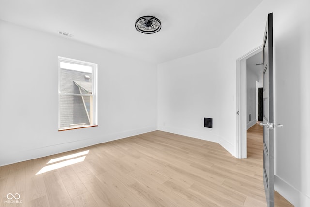 19 E Regent St, Indianapolis, IN 46225 - spare room with light wood-style floors and baseboards