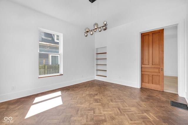 19 E Regent St, Indianapolis, IN 46225 - empty room featuring built in features and baseboards